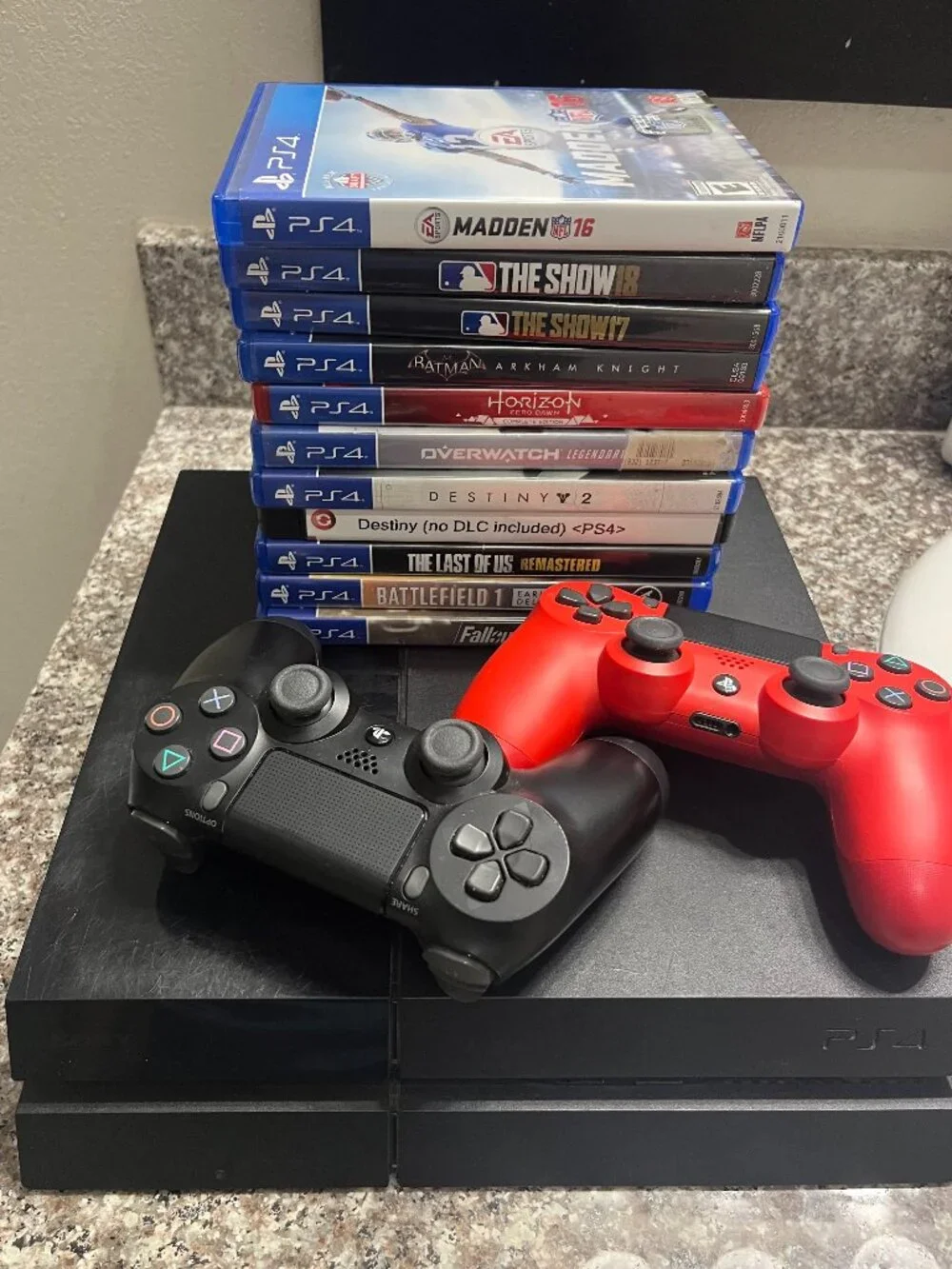 PS4 500 GB with 2 controllers and assorted games